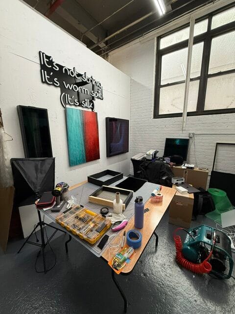 IMG_4635 I have a big 4x4 table that I use to frame on. Typically I put something soft on the table, like a large piece of cardboard (usually the one that comes with the frame) as to protect it better. I have an air gun and vacuum system to remove dust from the glass.