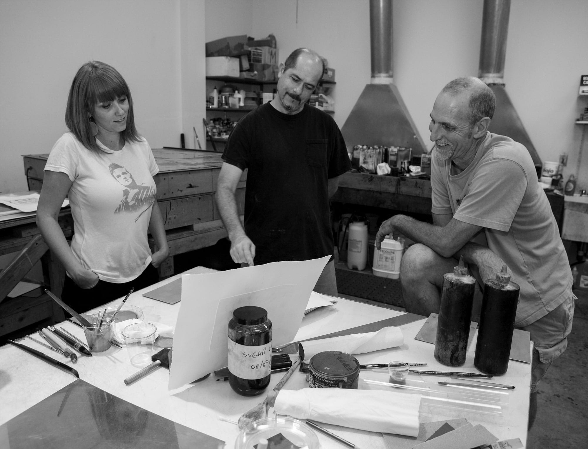 Robyn O’Neil working  with master printers Tim Baker (middle) and Tom Pruitt.